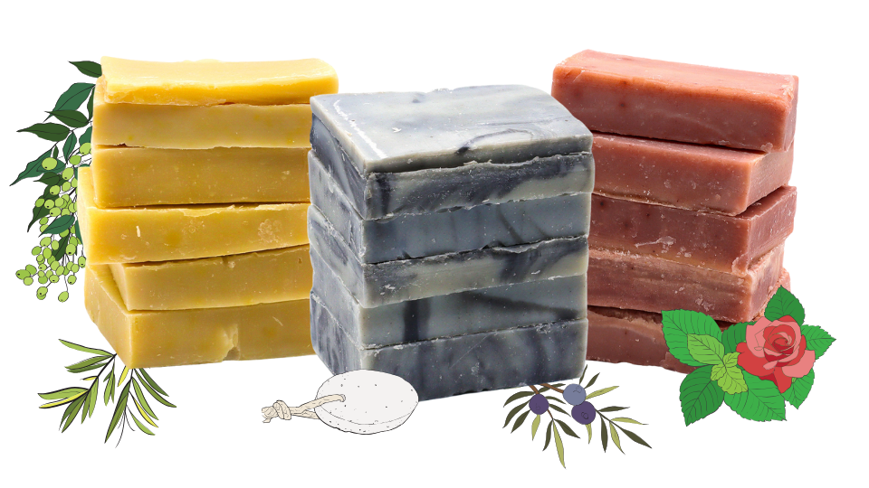 Stacks of different colored soap bars with decorative elements on a white background